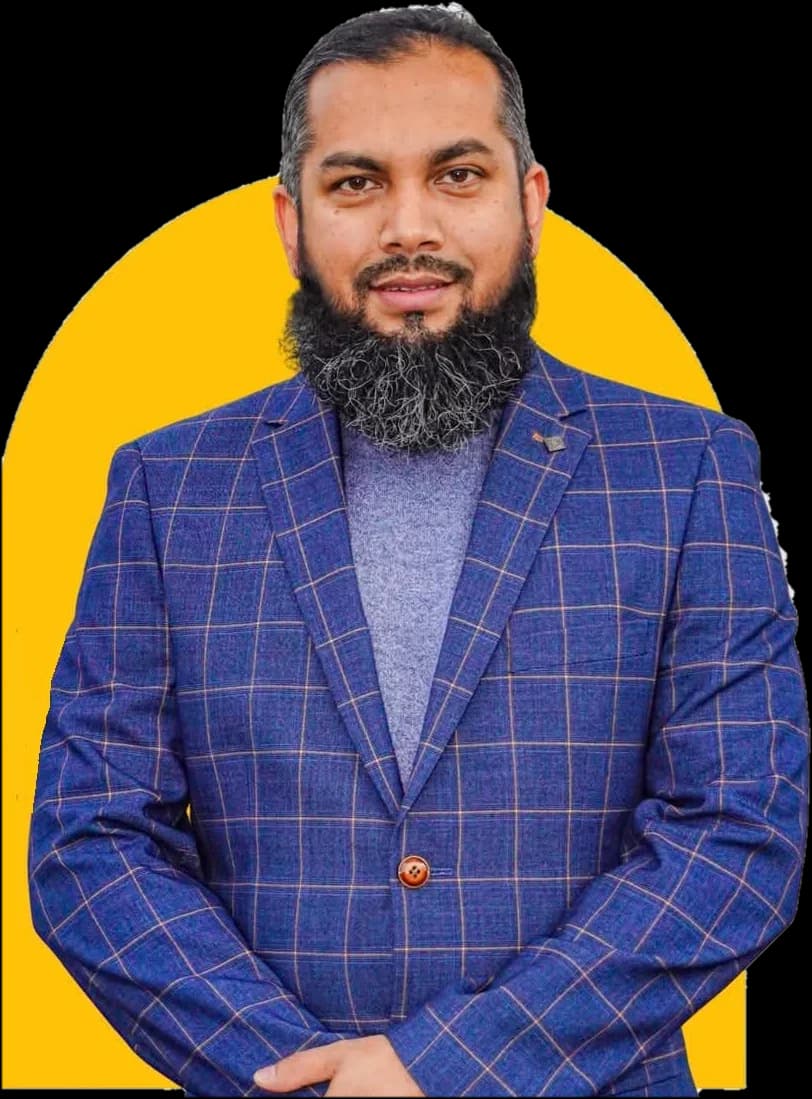 Portrait of Mashud Ahmad in a blue check suit